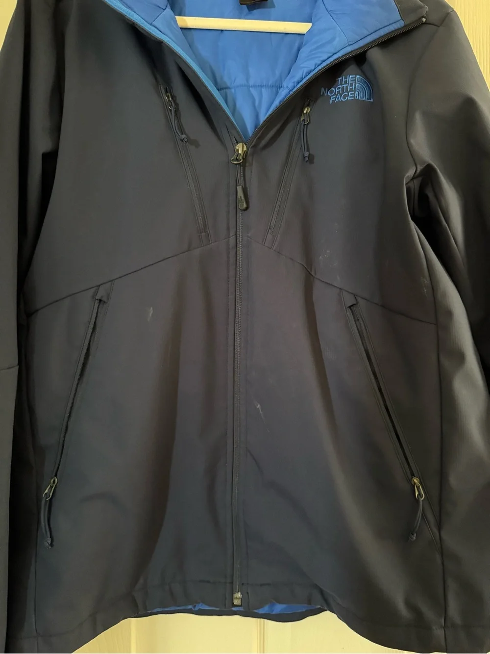The North Face Navy Jacket with Bright Blue Lining